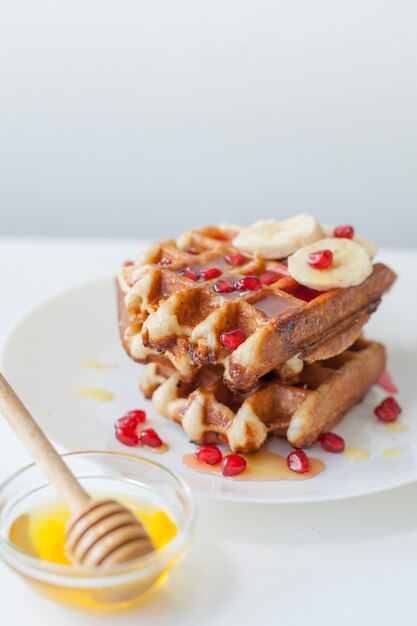 Waffle pile with honey