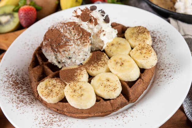 Waffle with ice cream and banana