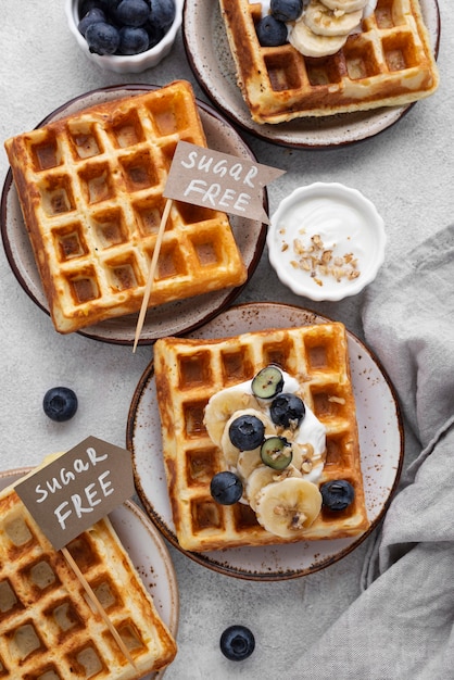 Waffles with fruits arrangement flat lay
