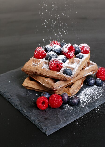 Waffles with raspberry and blueberry