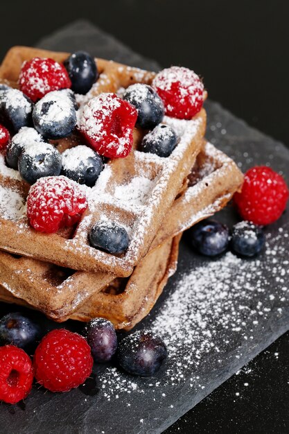 Waffles with raspberry and blueberry