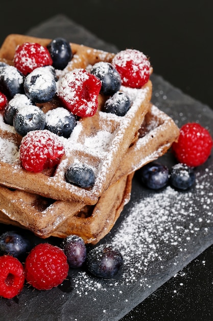 Waffles with raspberry and blueberry