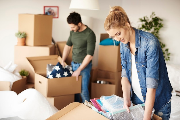 Waist Up Of Moving House Couple