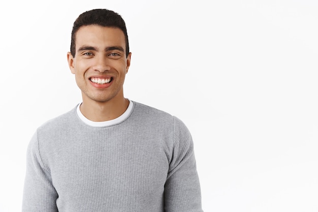 Waist-up portrait friendly-looking handsome masculine man with perfect white smile