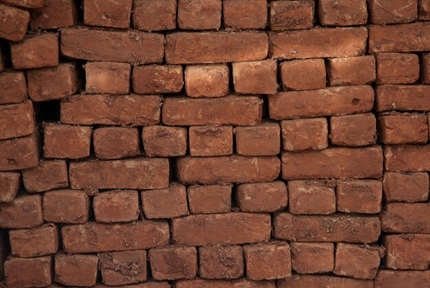 Wall of badly placed bricks