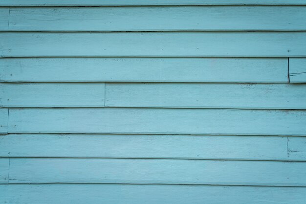 Wall of blue wooden boards