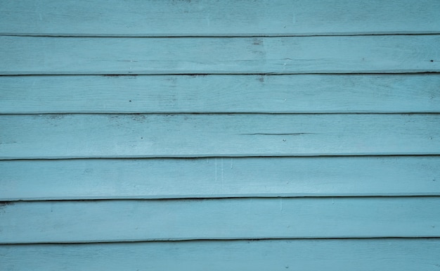 Wall of blue wooden boards