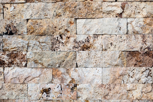 Текстура стены из различных камней для фона