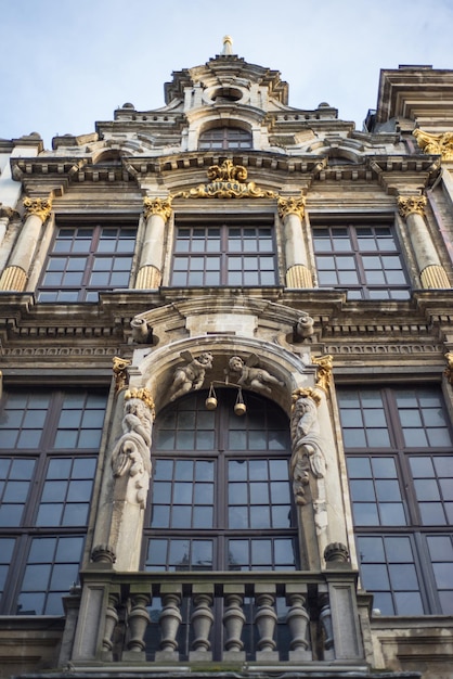 Wall of medieval gothic city hall in Grand Place