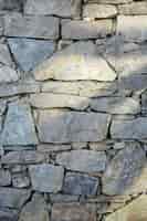 Foto gratuita muro di pietre texture di close-up