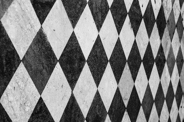 Wall with black and white tiles