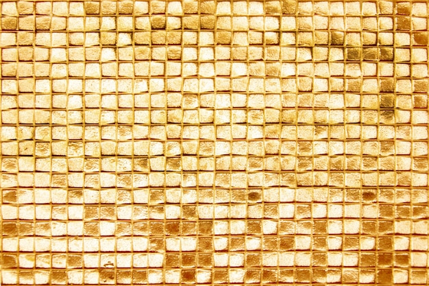 The walls are decorated with gold of tiles, texture background