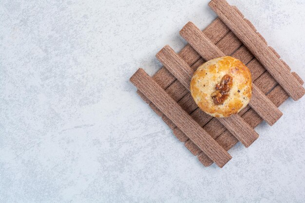 Walnut and stick biscuits on gray background. High quality photo