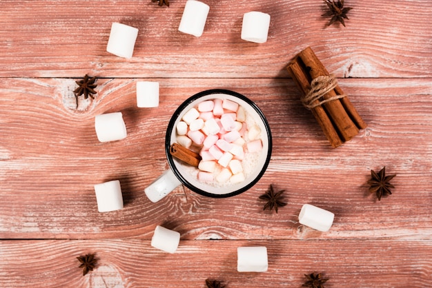 Warm cinnamon and marshmallows drink