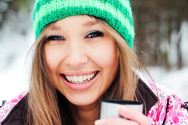 warm model front cheerful snowboarder