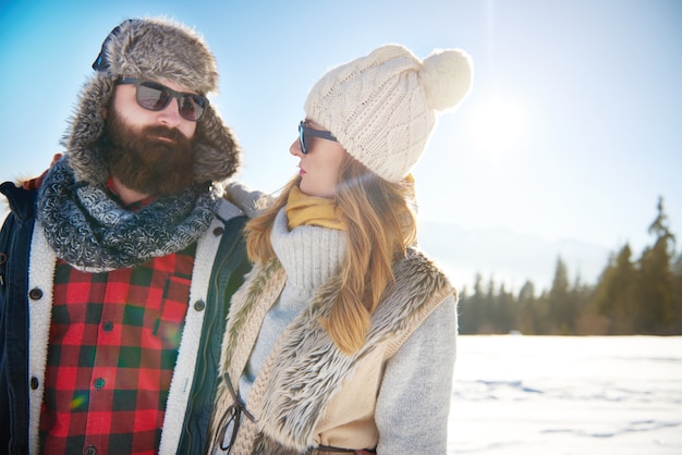 Warmly dressed couple in the moutnains