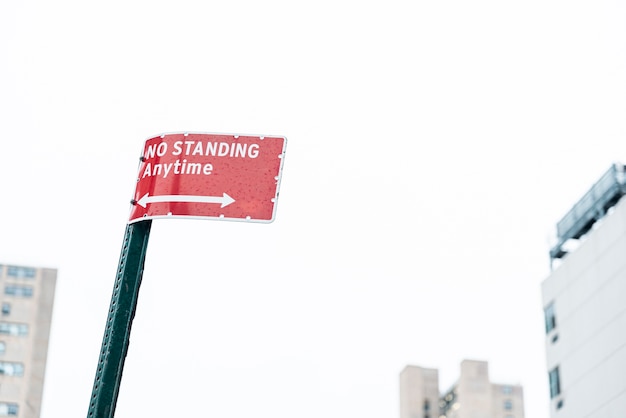 Warning street sign with blurred background