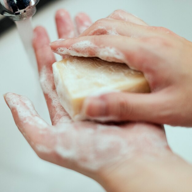 Washing hands with a bar soap