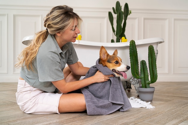 Free photo washing pet dog at home