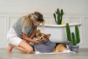 Free photo washing pet dog at home