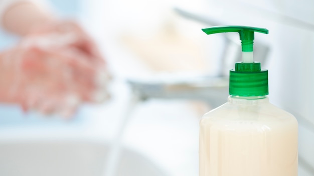 Washing your hands often with water and soap close-up