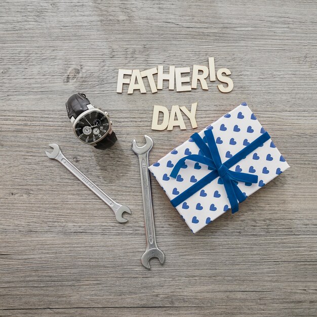 Watch, gift box and wrenches for father's day