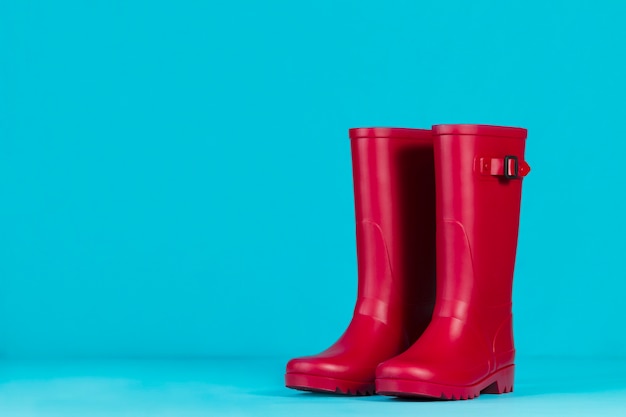 Water boots on blue background