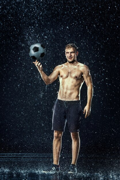 Water drops around football player