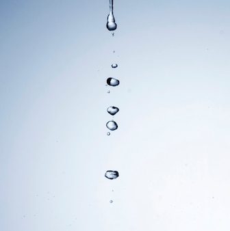 Water drops on light background