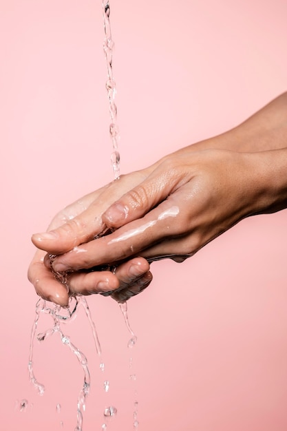 water poured on woman's hands