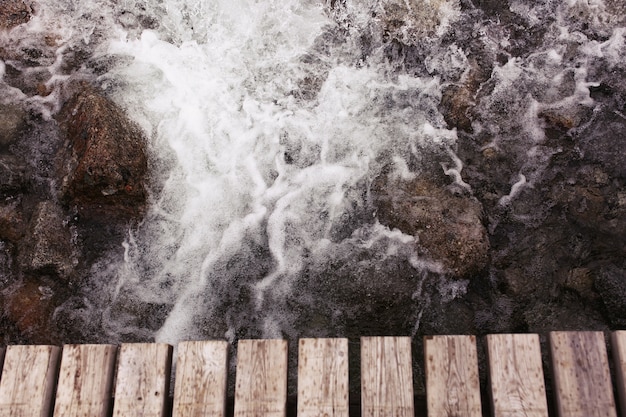 Water splashes against the rocks 