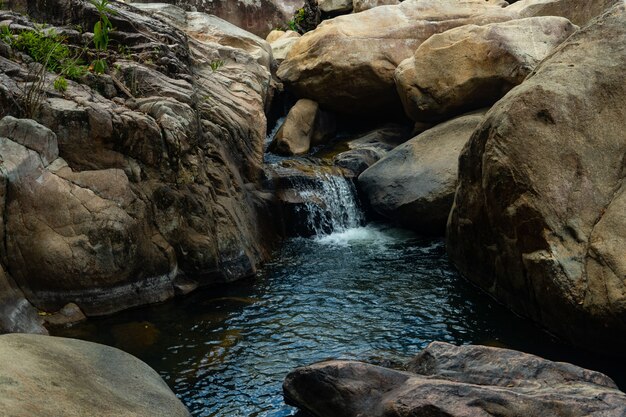 Water stream in the middle of rocks in Vietnam