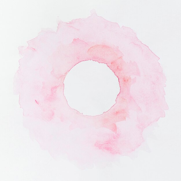 Watercolour pink paint circular background