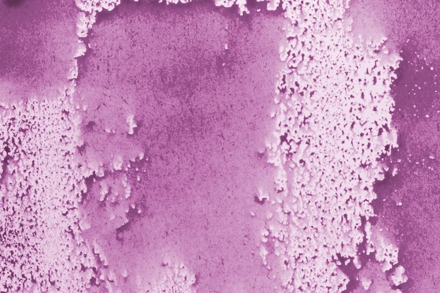 水彩の紫色の塗料の抽象的な背景