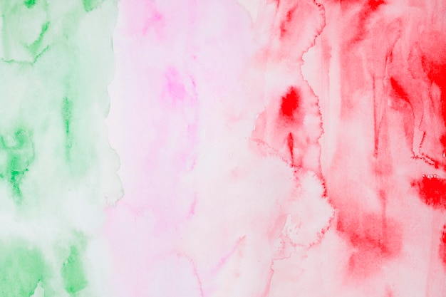 Watercolour red and green paint abstract background