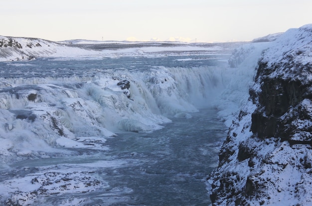 Waterfall of Gullfoss in Iceland, Europe surrounded by ice and snow