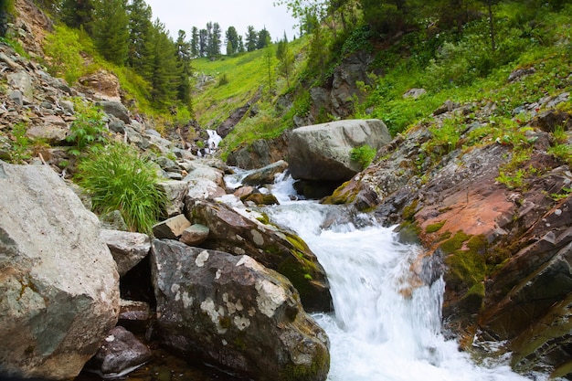 waterfall in rocky Altai mountains