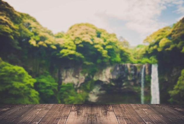 Waterfall with green trees by the sides