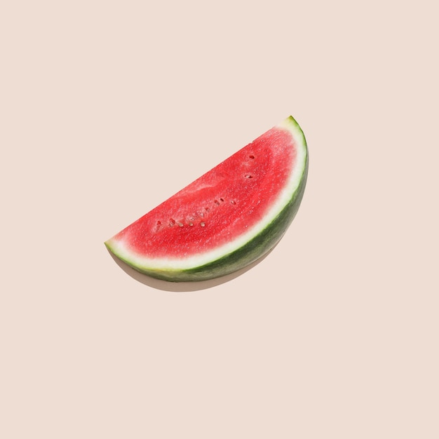 Watermelon cut on creamy background