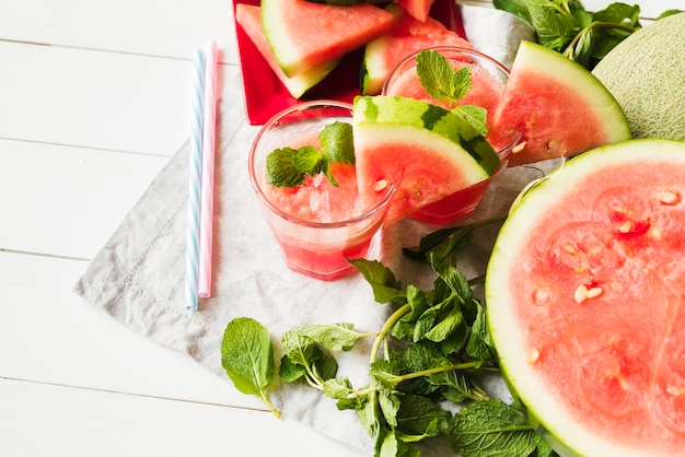 Watermelon mint drinks and straws on napkin