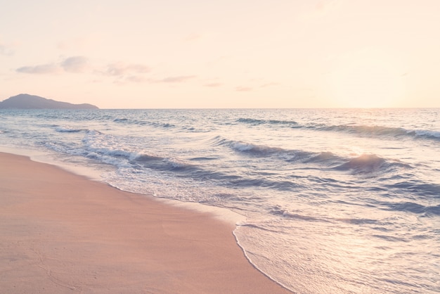 Waves of the sea at sunset