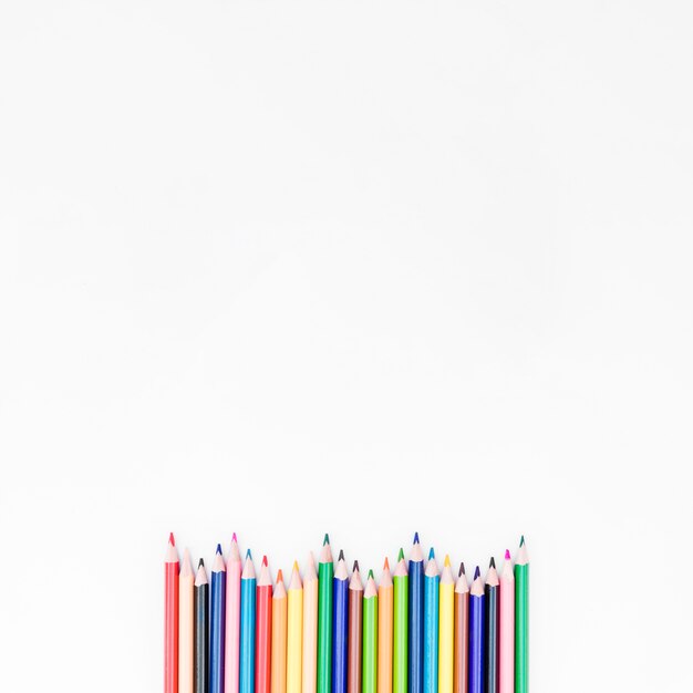 Wavy line of colored pencils