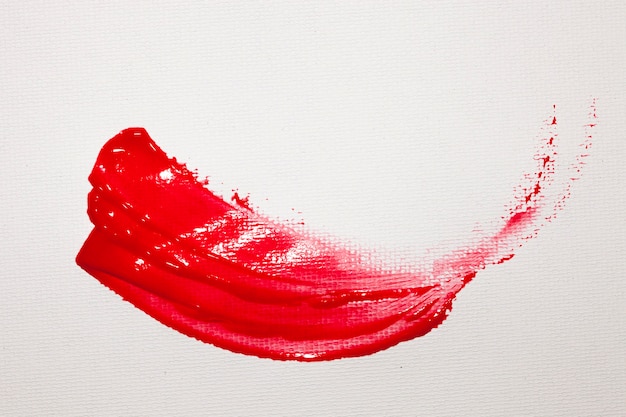 Wavy red paint stain