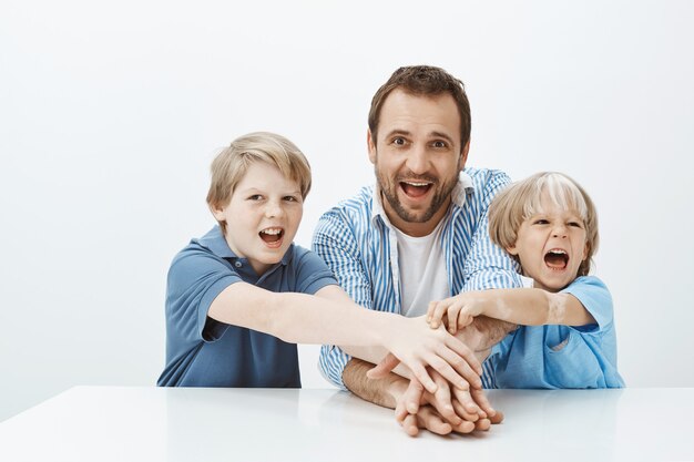 We all in this together. Portrait of happy playful family sharing joyful moments