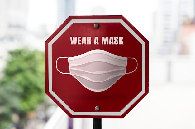 Free photo wear a mask street sign board