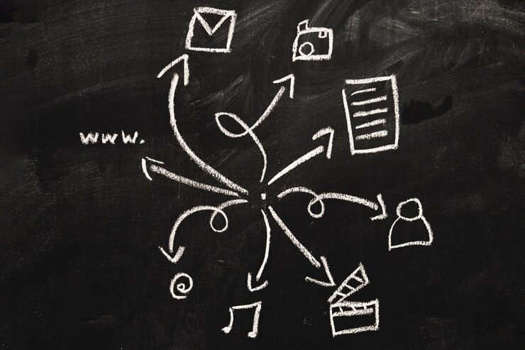 Free Photo web icon set drawn on chalkboard with white chalk