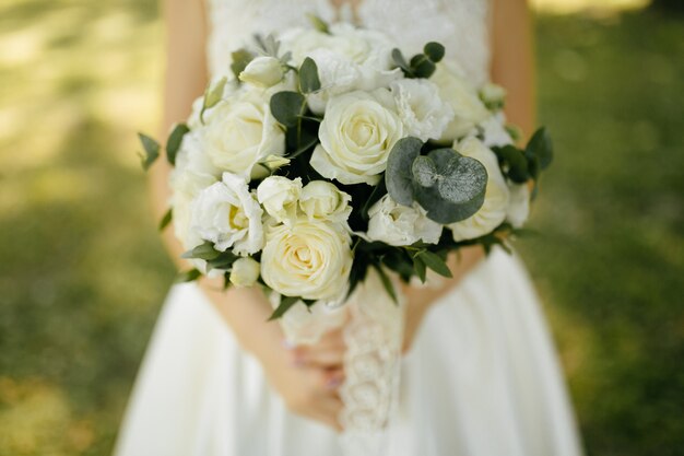 wedding bouquet in bride's hands