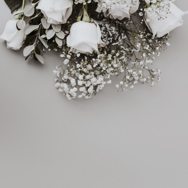 wedding bouquet of white roses with space at the bottom