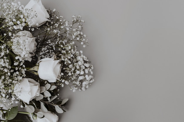 wedding bouquet of white roses with space to the right