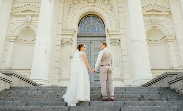  Wedding couple. Beautiful couple, bride and groom look at each other 